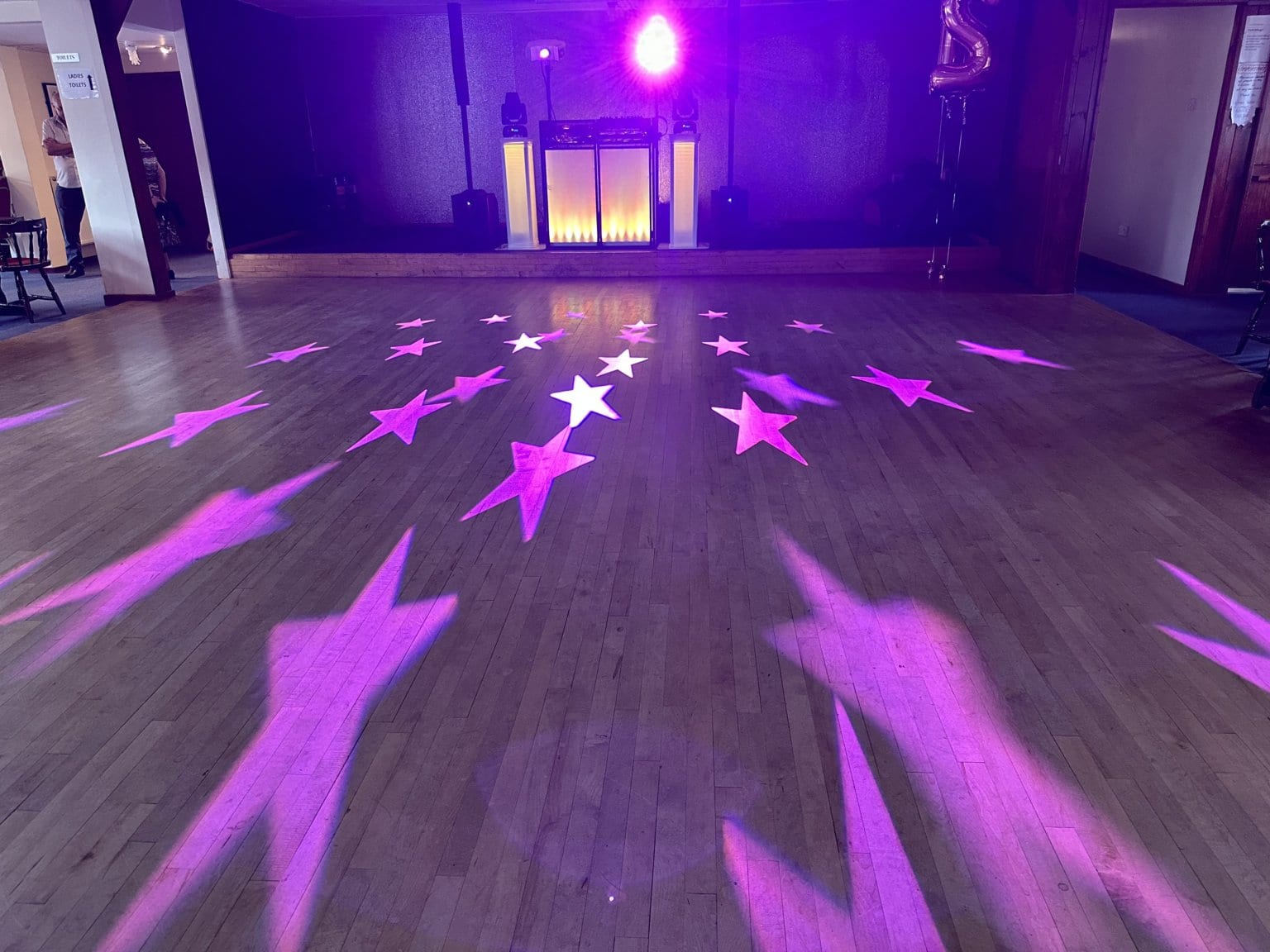21st Birthday Disco in Cambridge with purple stars. Your personalised disco