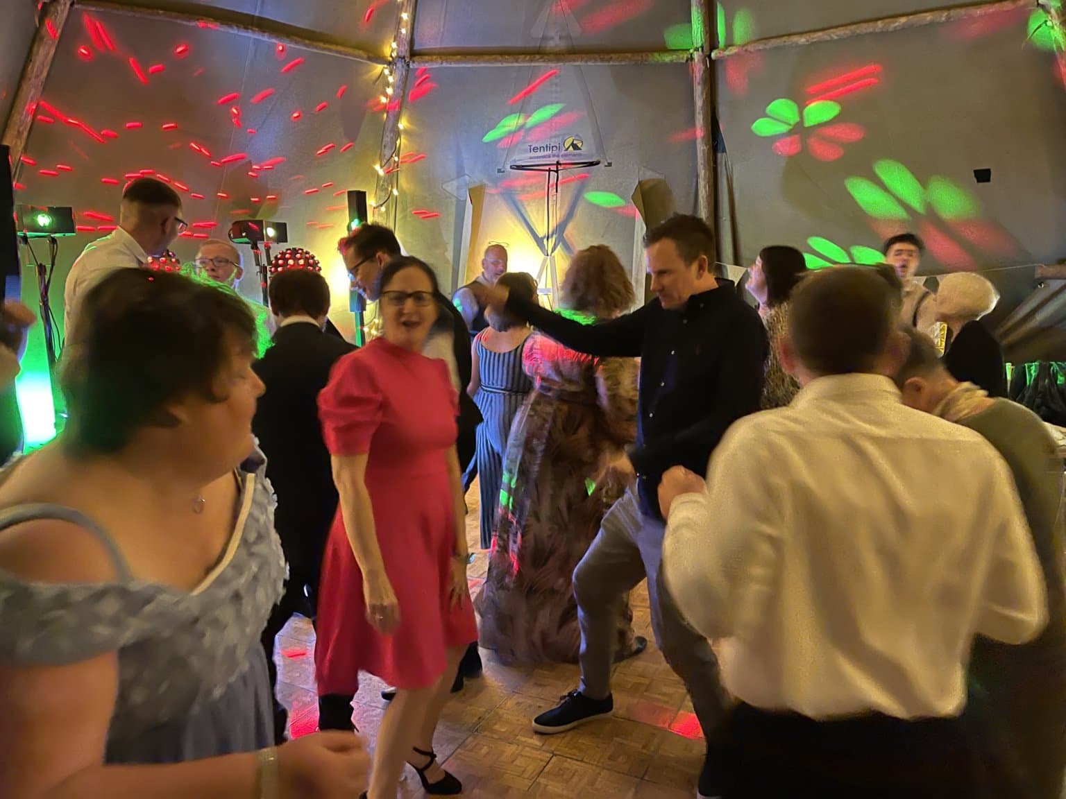 Summer events - Guests dancing at a Wedding in Marquee near Cambridge