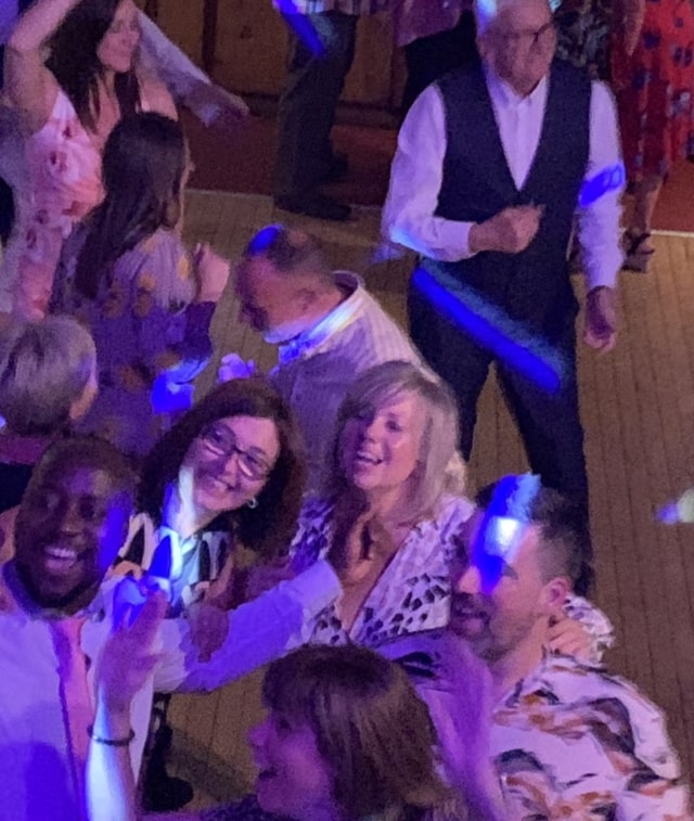 Enjoying the most popular dance tunes at a wedding reception